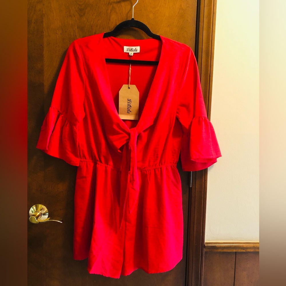 Listicle Solid Red Romper. Bell sleeves, lined, Bow Toe top. Size medium. new!